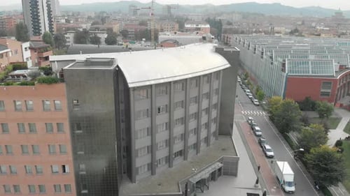 Aerial shot from a drone over a fancy building.