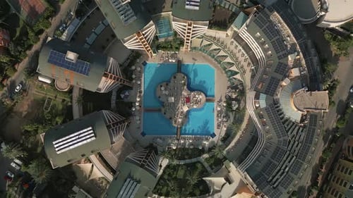 Drone Descent to the Territory of the Hotel Over the Pool