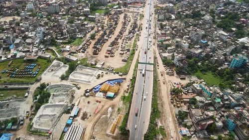 Aerial shot of a busy road where vehicles are passing in Dhaka, Bangladesh
