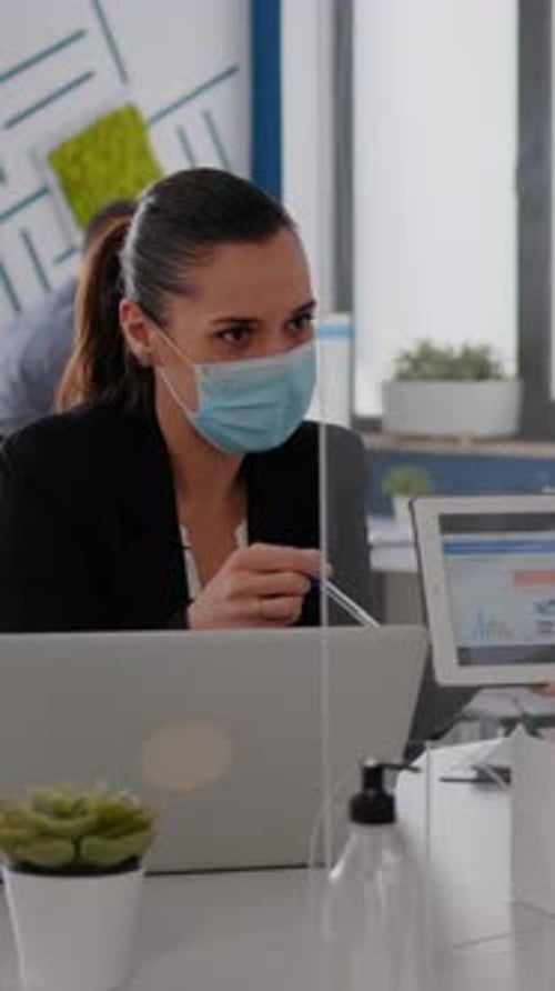 Vertical Video Close Up of Coworkers with Face Mask Working Together at Financial Project