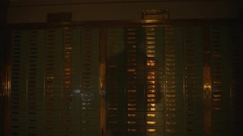 Safety Deposit Box Wall in Dimly Lit Vault