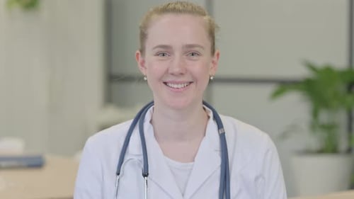 Portriat of Smiling Female Doctor in Clinic