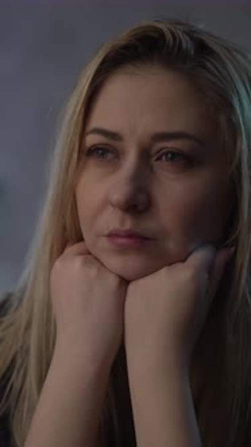 Unhappy Lady with Messy Hair Suffers From Depression in Room