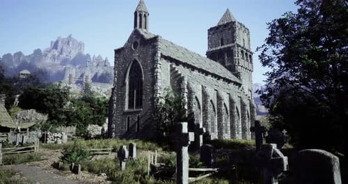 Antigua iglesia de piedra rodeada de tumbas cerca de ruinas antiguas en un paisaje sereno