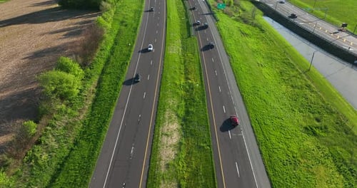 Aerial of divided highway through rural Lancaster County farmland.