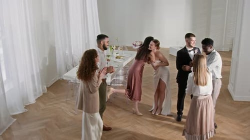 Guests Waiting for Newlywed Couple in Restaurant