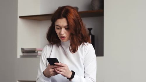 Portrait of Happy Business Woman Enjoy Success on Mobile Phone at Home Office Closeup Joyful Girl