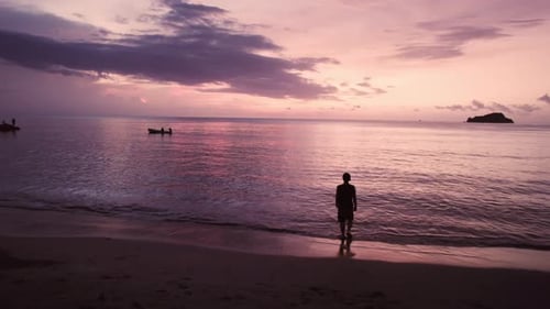 Man silhouette against sunset in Santa Marta - Colombia