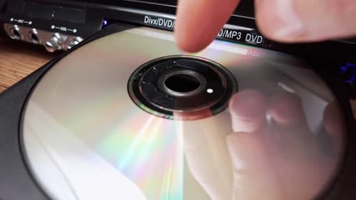 Descargar un disco compacto del reproductor de DVD