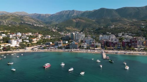 Drone Flies Above Himare, Albania on Beautiful Summer Day in Albanian Riviera