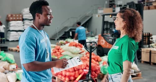 Happy people, volunteer or support with handshake for charity help or assistance at NGO warehouse