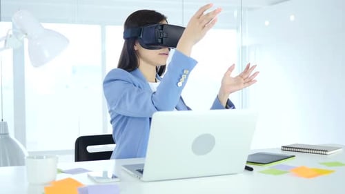 Woman Using Virtual Reality Headset in Office