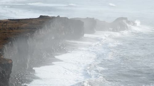 Ocean Coastline in Iceland Volcanic Mountains Black Cliffs and Huge Waves Famous Tourist Attraction