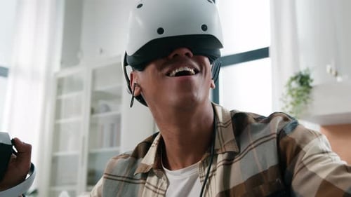 Young Adult Immersed in Virtual Reality Gaming