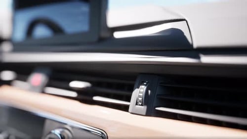 Modern Car Interior Dashboard with Air Vent and Wooden Trim