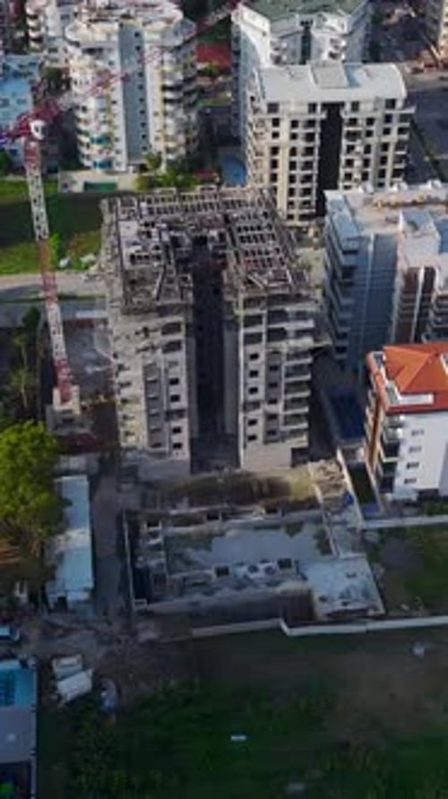 Vertical Video Industrial Construction with Crane Operation and Assembly Work