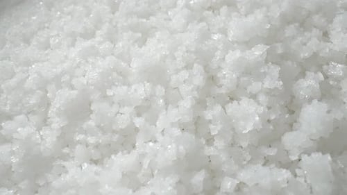 Flower of Salt: Delicate, hand-harvested sea salt with fine, crystalline structures.