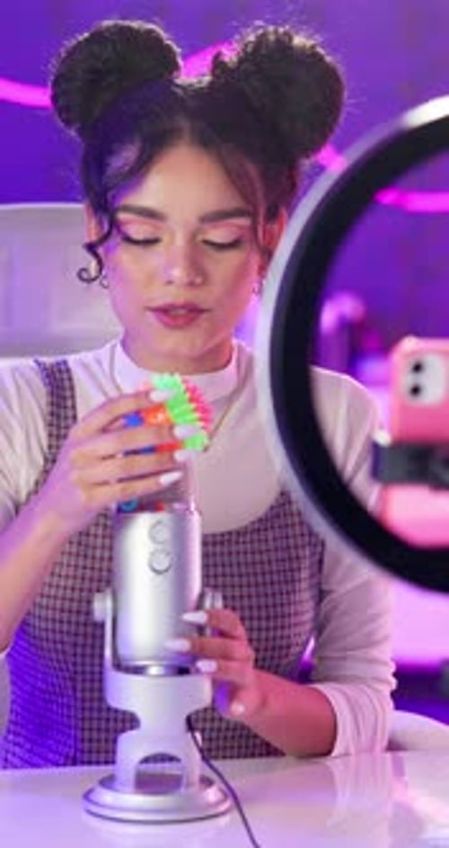 Woman, microphone and live streaming for social media broadcast with ball Asmr