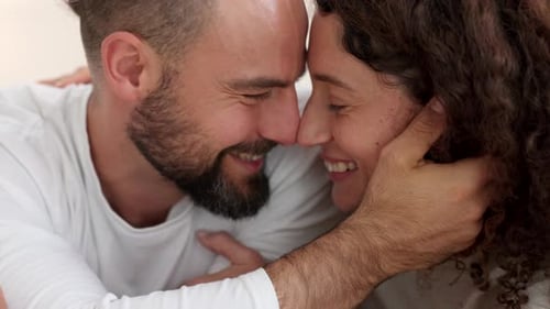 Affectionate Couple Embracing Indoors at Home