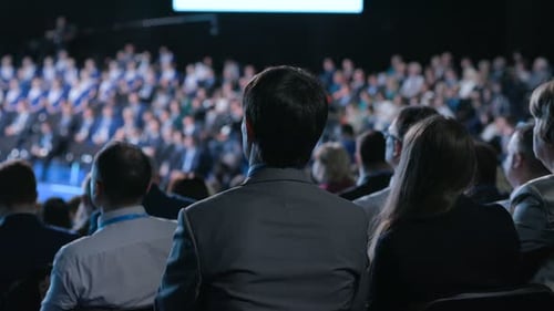 Audience Attending Corporate Conference or Presentation