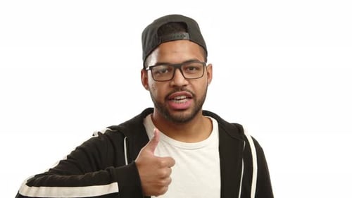 Man Giving Thumbs Up on White Background