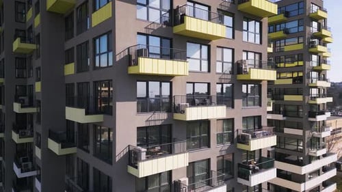 Aerial Drone View of Colorful Residential Buildings with Unique Architectural Facades Showcasing