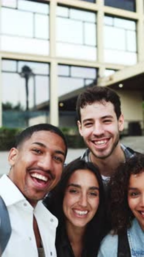 Group of Friends Smiling for a Selfie in City