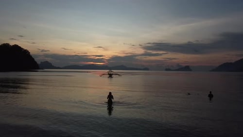 Sunset with boats moored in El Nido, Palawan, Philippines