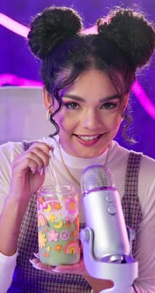 Live streaming, microphone and woman on social media broadcasting drinking Asmr