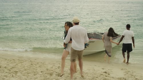 Group of Friends Sitting at a Picnic and Get Up and Walk