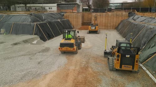 Forwards Tracking of Front Loader Moving on Construction Site Around Various Machinery Frankfurt Am