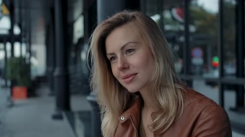 Young 30s Modern Attractive Woman Portrait Looking at City Street Outdoors