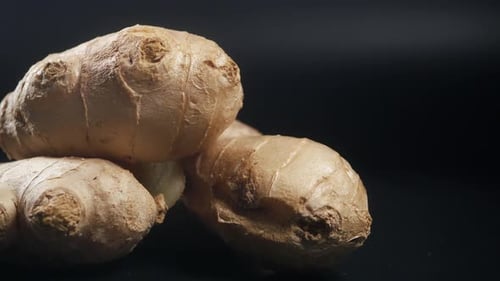 Close Up of Gingers on Chopping Board