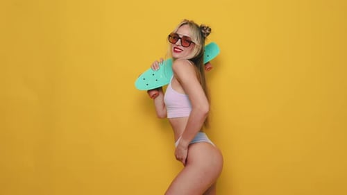 Young beautiful woman in swimwear