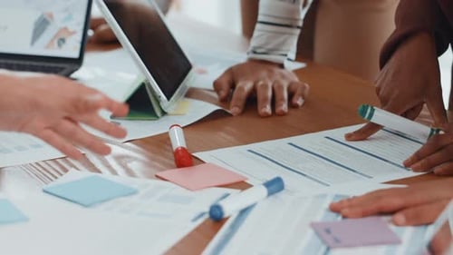 Paperwork, planning and business people in office with finance graphs, charts or statistics