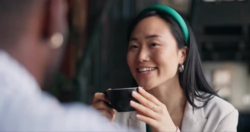Happy asian woman, friends and coffee at cafe for conversation, catch up or break together