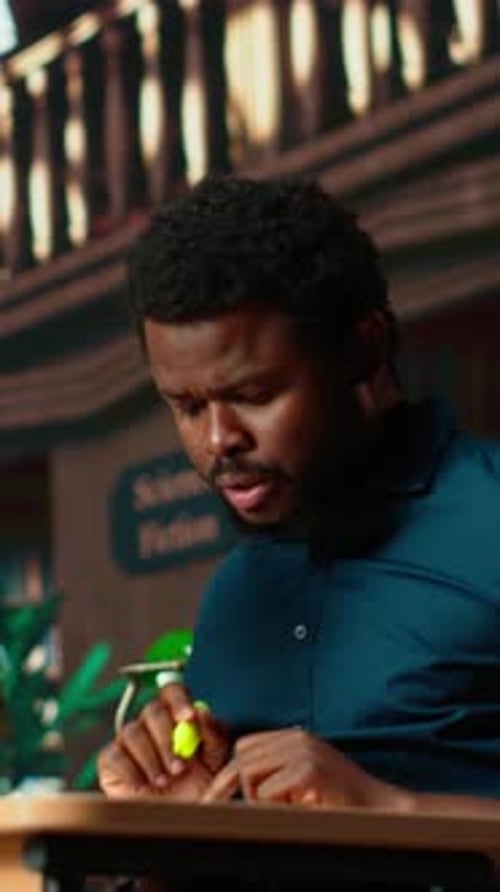 Vertical Video Black University Student Highlighting Relevant Phrases to Learn the Summary