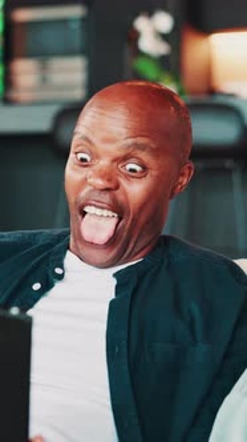 Home, funny and black man with tablet, video call and facial expression with live streaming