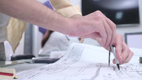 Group of architect and designer is designing a green home building that takes advantage of natural e