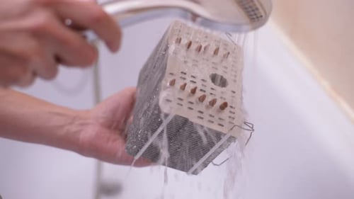 Hand Washing Computer Cooler in a Bathtub