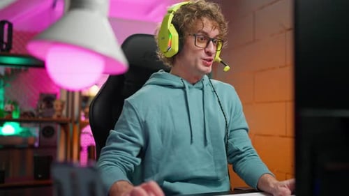 Excited Gamer Plays Video Game at Home