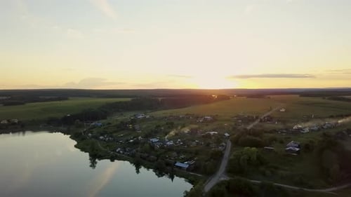 Idyllic Rural Village at Sunset Aerial View