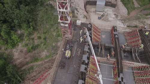 Builders Work on Section of Transport Bridge Over Hollow