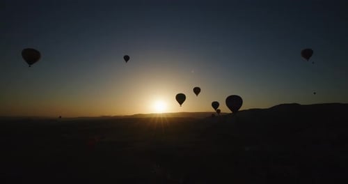 Cappadocia landscape with hot air balloons, at sunrise, Turkey