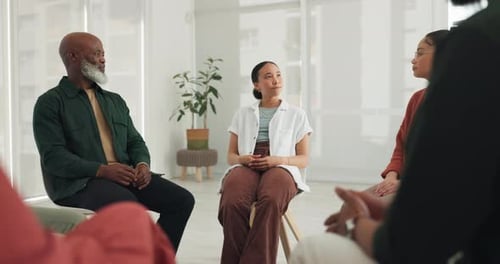 Adults in Group Therapy Session Indoors