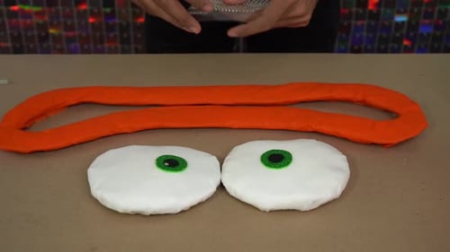 Adding puffy details to complete the piñata