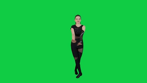Attractive Woman Dancer in Black Bodysuit dancing in front of a Green screen