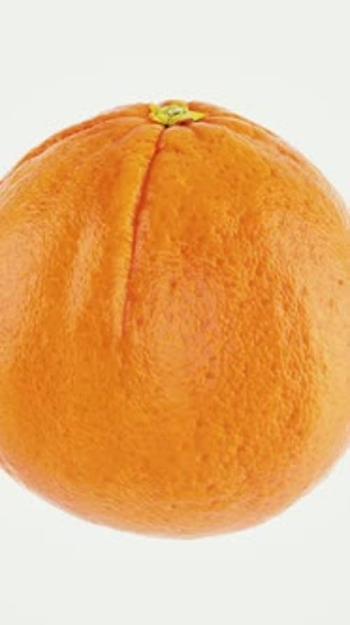 Seamlessly Rotating Orange Fruit on White Background