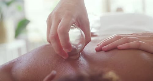 Relaxing day at the spa with cupping therapy. Calming massage with vacuum glasses
