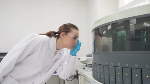 Woman Scientist Working with Lab Equipment in Hospital
